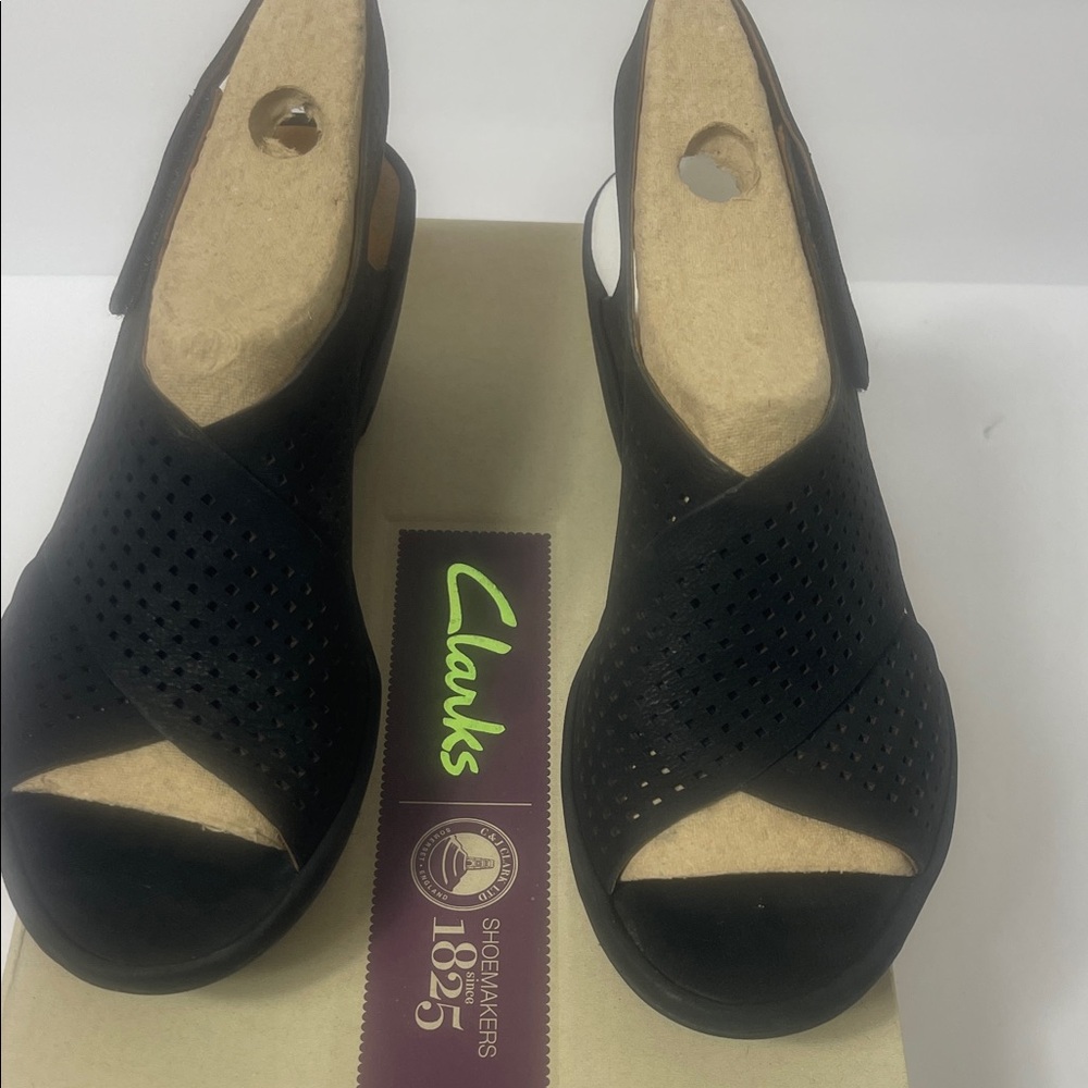 Clarks Nerisa Vine black nubuck wedge sandal.